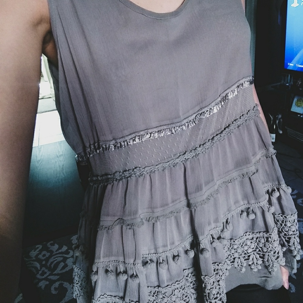 Embellished tank